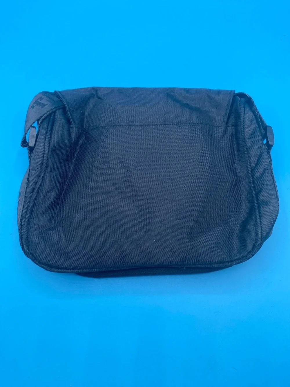 Trapstar Black Messenger Bag with Decorative Cross Buckle